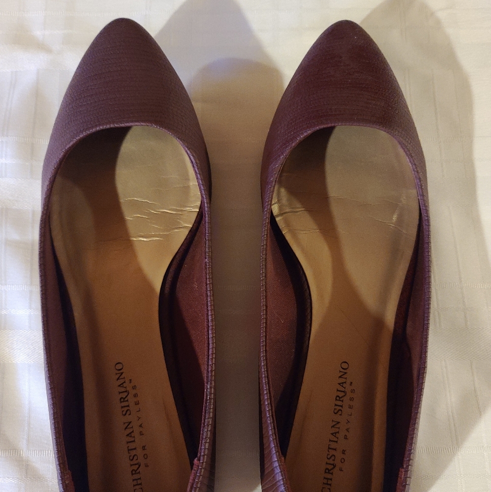 Plum-colored pointy toed flats